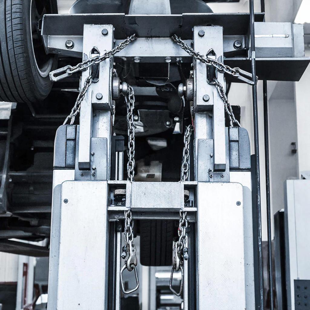 Двухстоечный подъемник: Выбираем между асимметрией и грузоподъемностью